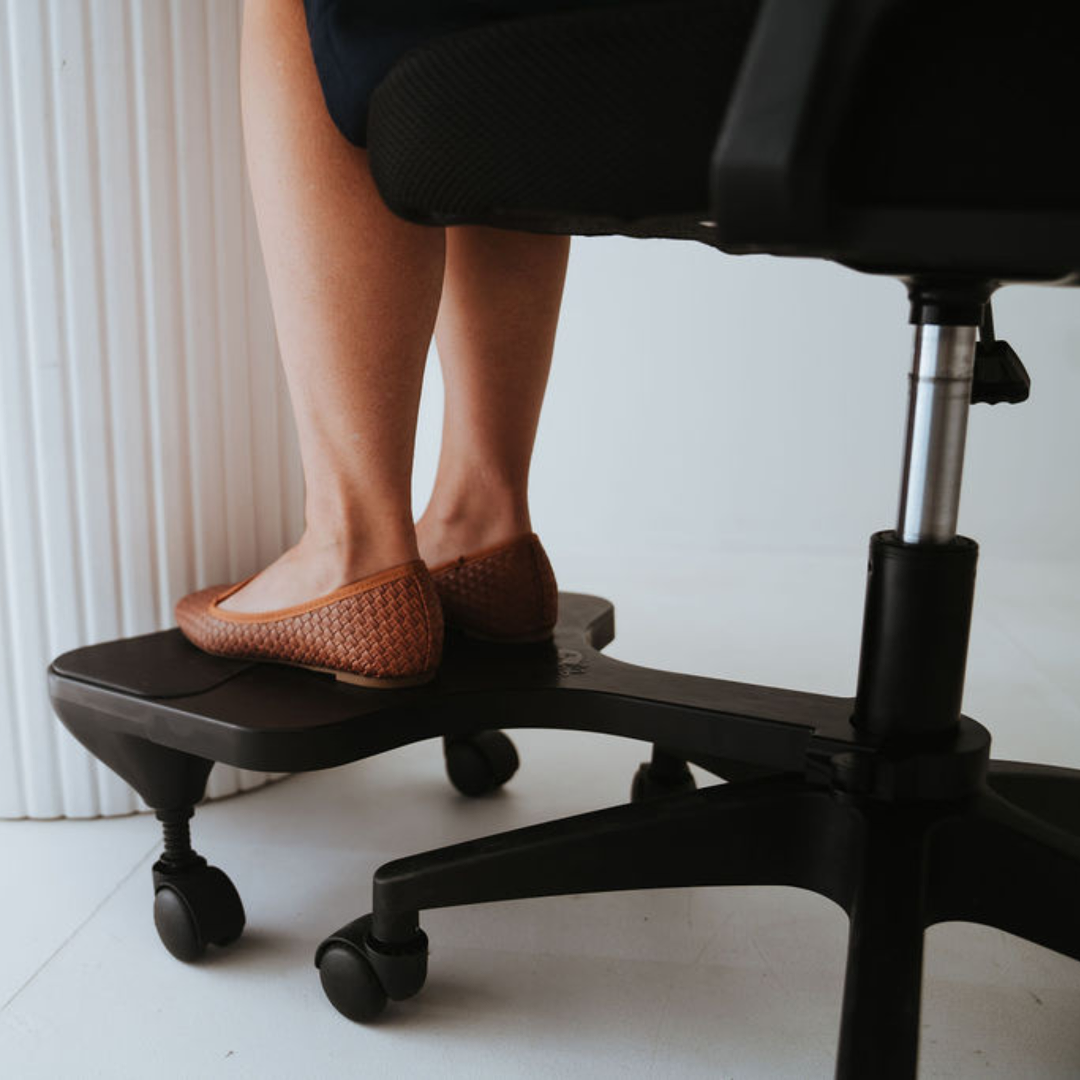 Lower Back Discomfort at Your Desk? Start With Foot Support